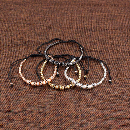 Hand-woven bracelet with diamond spacers