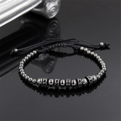 Hand-woven bracelet with diamond spacers