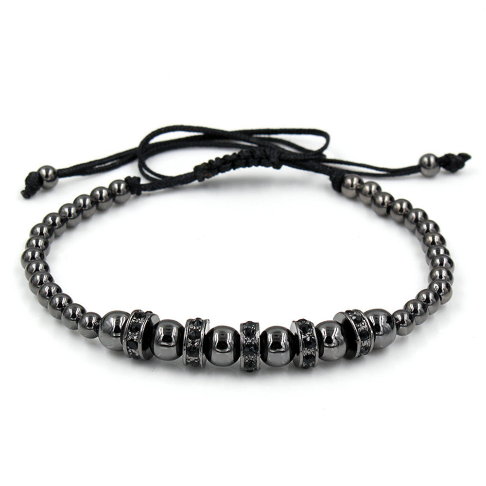 Hand-woven bracelet with diamond spacers