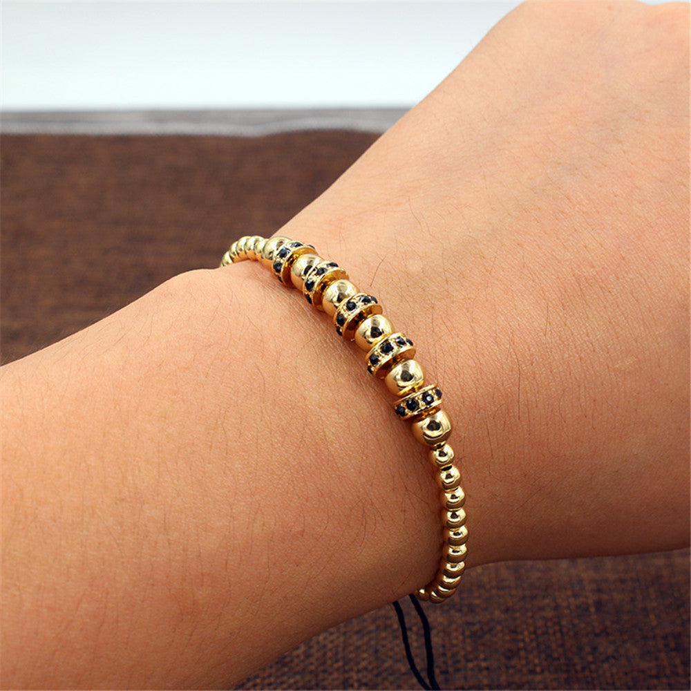 Hand-woven bracelet with diamond spacers